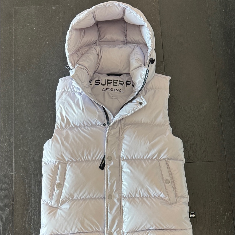 The SUPER PUFF Light lavender Hooded Puffer Vest